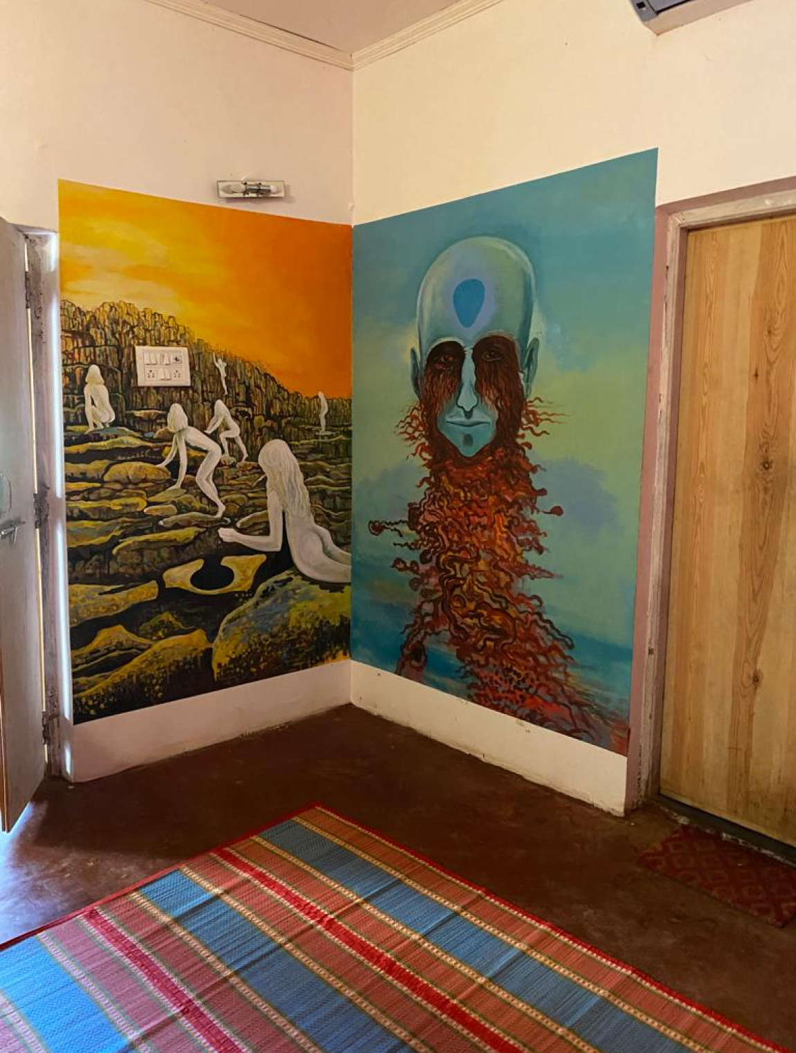 Surreal wall murals at Home of Gaia — the artistic spirit of the space